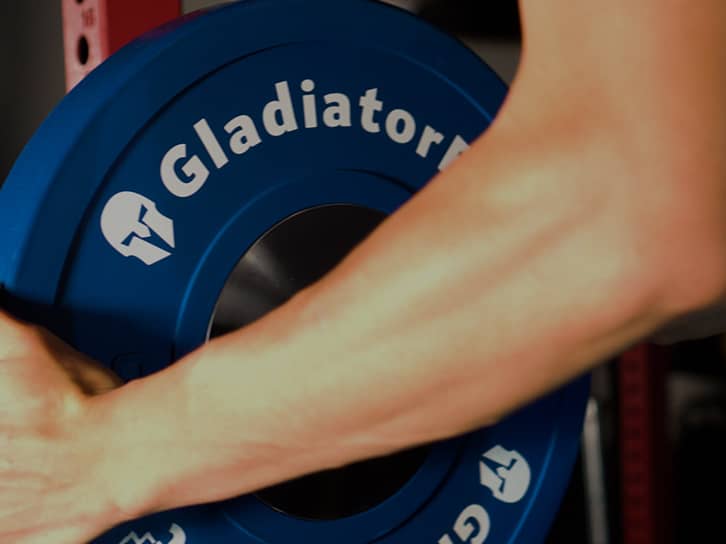 Photo d'un poids de fitness installé sur une barre de la marque GladiatorFit